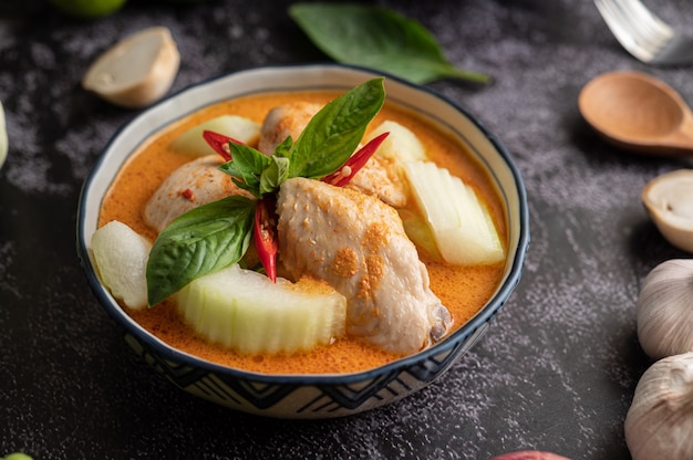Chicken curry with winter melon, with mushroom, garlic, chilli and basil