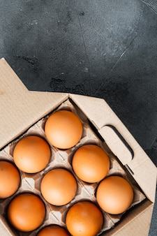 계란 상자 트레이 세트, 회색 테이블, 평면도 평면 누워, copyspace에 닭고기 달걀