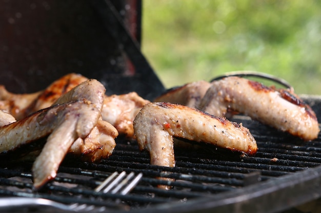 Chicken legs on the grill