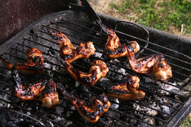 Chicken legs on the grill