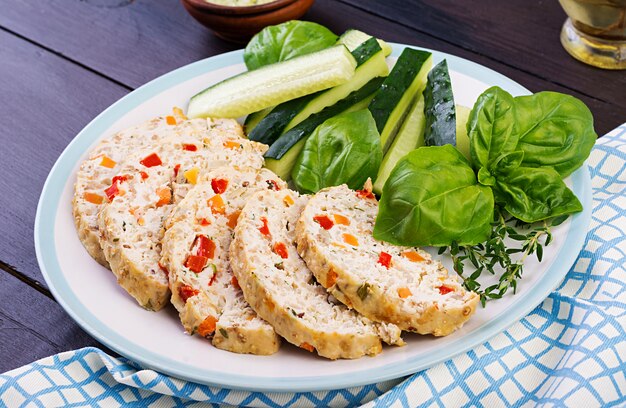 Chicken meat loaf with vegetables. Healthy meatloaf.