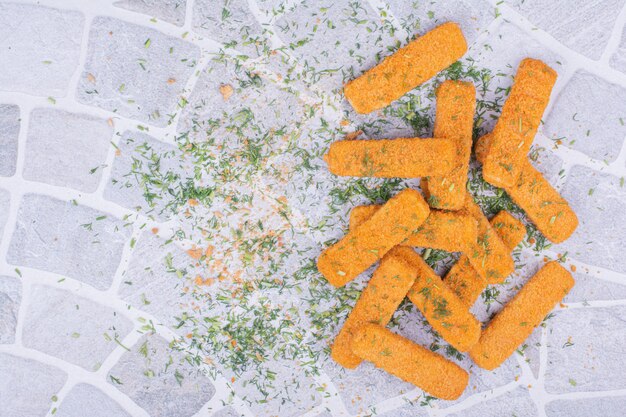 Chicken nugget sticks with herbs and spices.