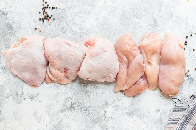 Chicken raw meat pieces of poultry carcass breast, thigh, wings snack