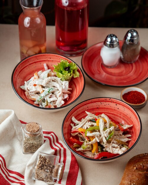 Chicken salads  with bell peppers  sour cream  side view