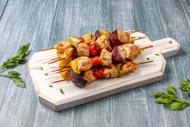 Chicken shish kebab with vegetables,ketchup,mayonnaise