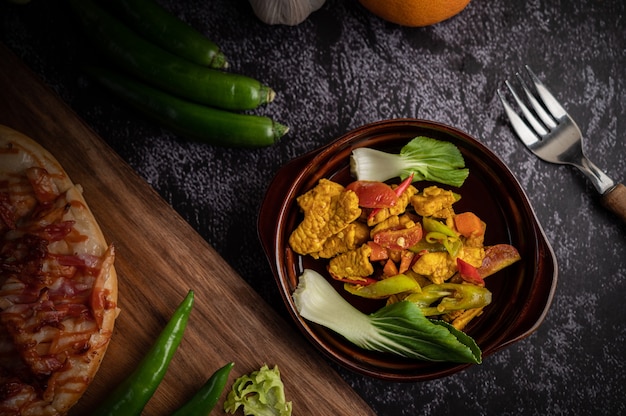 Chicken Stir Fried Chili Along with bell pepper, tomatoes and carrots