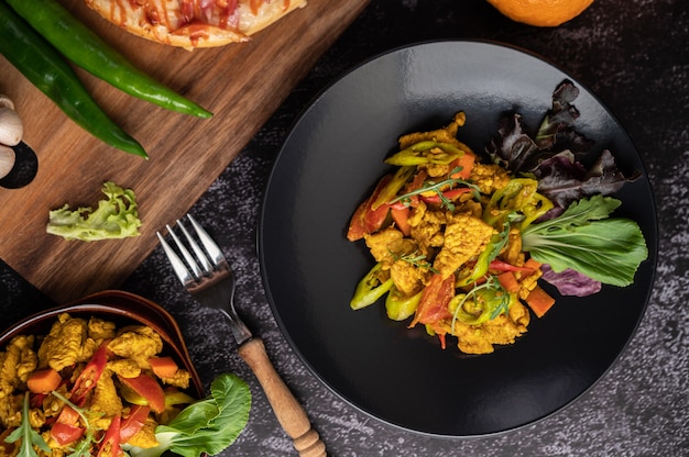 Chicken Stir Fried Chili Along with bell pepper, tomatoes and carrots