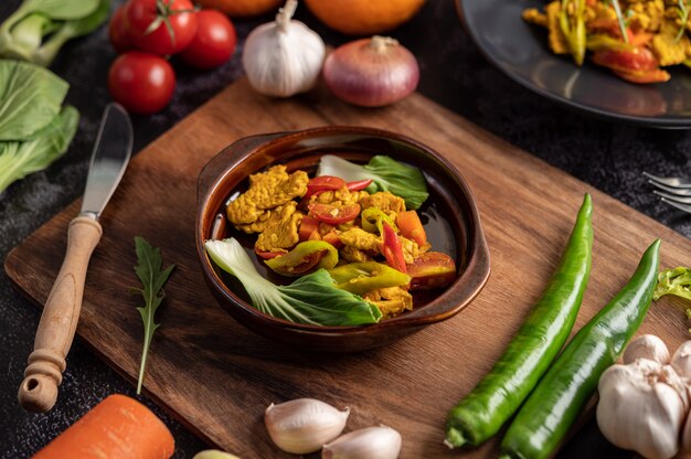 Chicken Stir Fried Chili Along with bell pepper, tomatoes and carrots