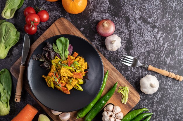 Chicken Stir Fried Chili Along with bell pepper, tomatoes and carrots