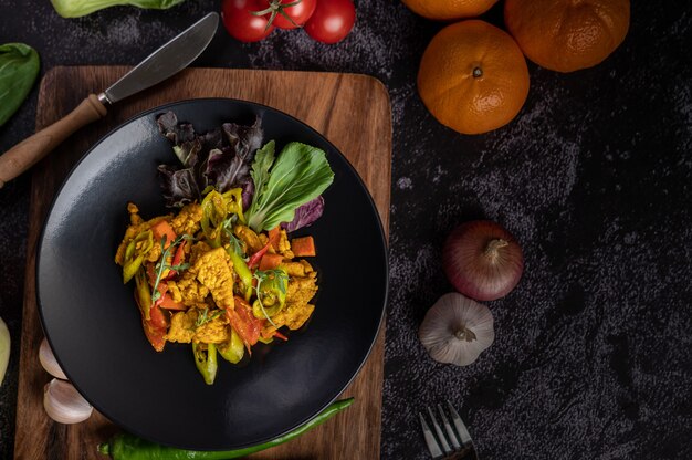 Chicken Stir Fried Chili Along with bell pepper, tomatoes and carrots