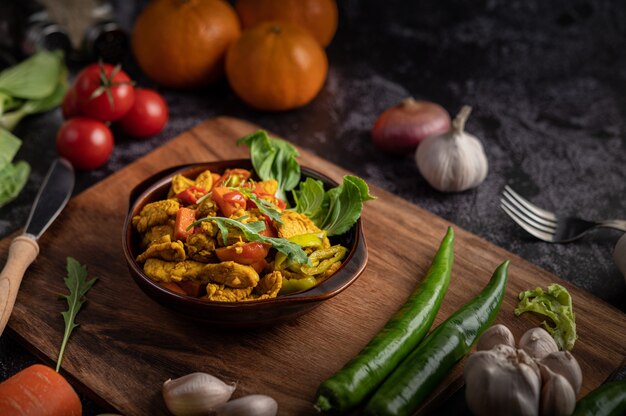 Chicken Stir Fried Chili Along with bell pepper, tomatoes and carrots