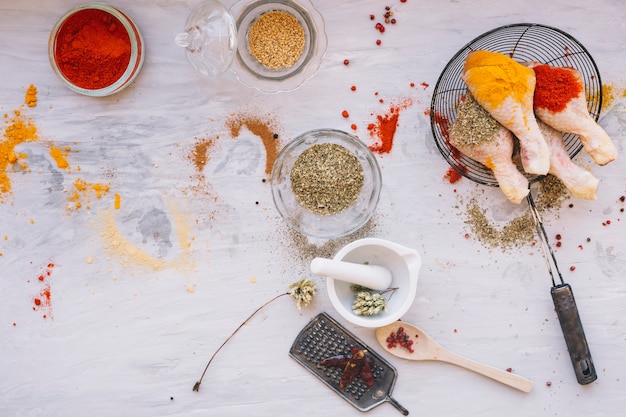 Free photo chicken with spices in sieve