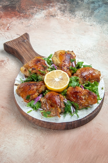 chicken the wooden cutting board with chicken lemon herbs on lavash