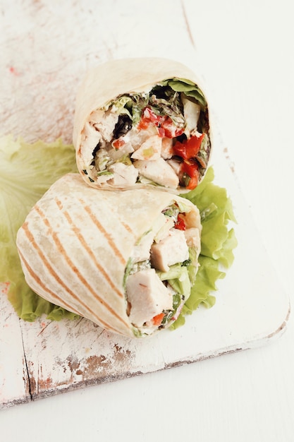Chicken wrap with lettuce and tomato