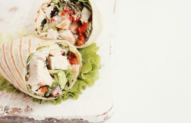 Chicken wrap with lettuce and tomato