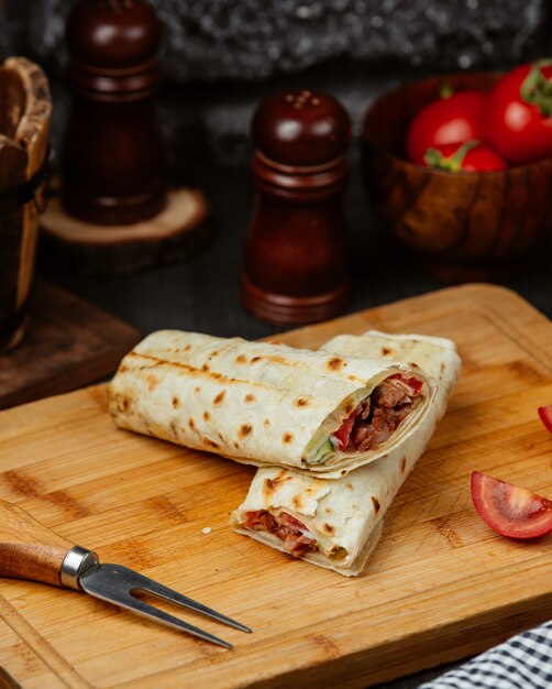 chicken wrap with tomato, cucumber and mayonnaise