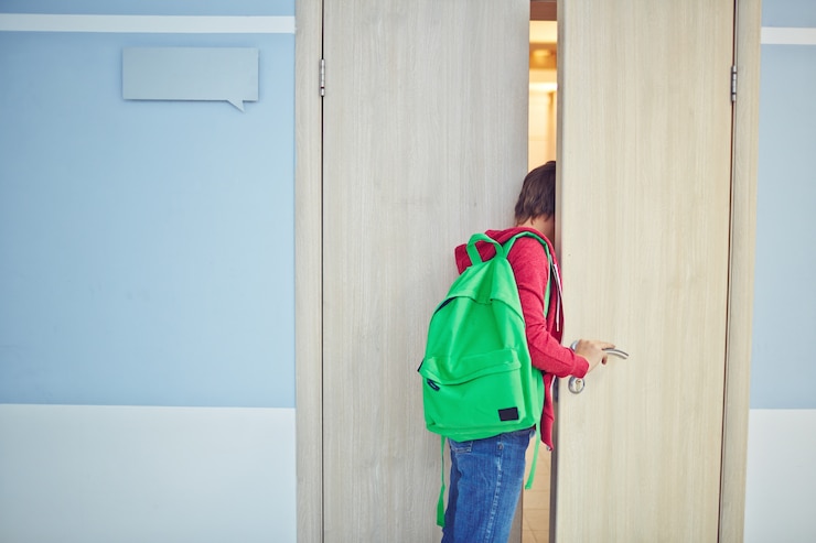 Free Photo child arriving late to class