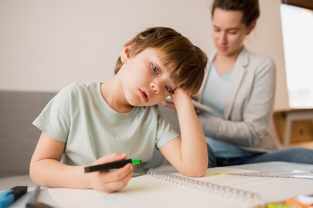 Child bored at home while being tutored