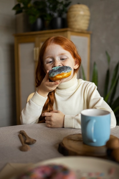 Child doing household activities indoors