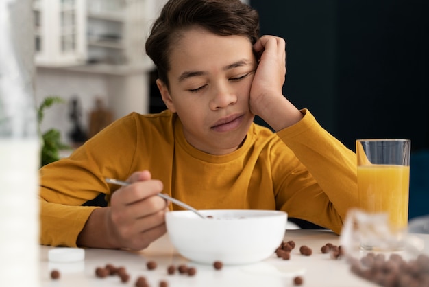 Child eating in dirty house