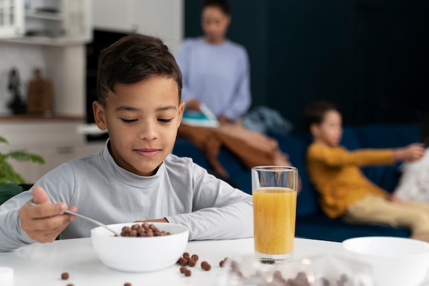 Child eating in dirty house