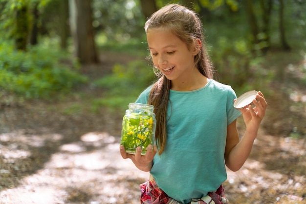 Child exploring the forest on environment day