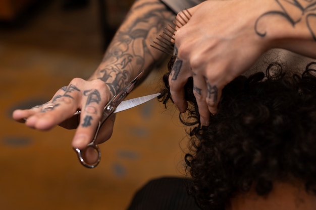 Free photo child getting a haircut at the salon