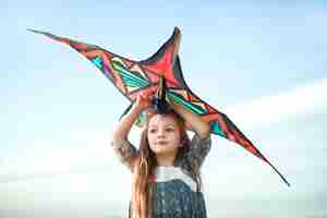 Free photo child having fun with kite