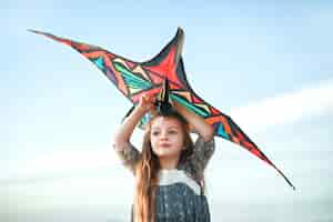 Free photo child having fun with kite