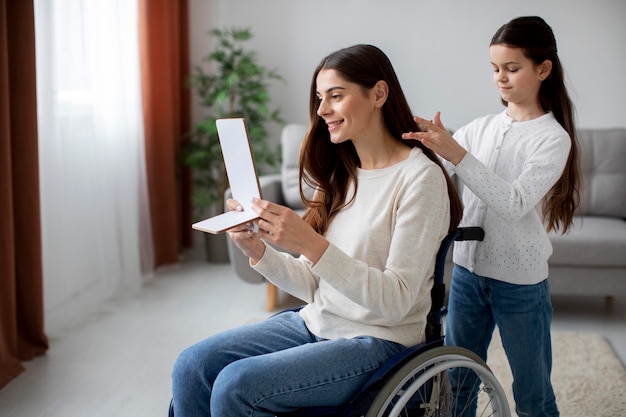 Child helping her disabled mother