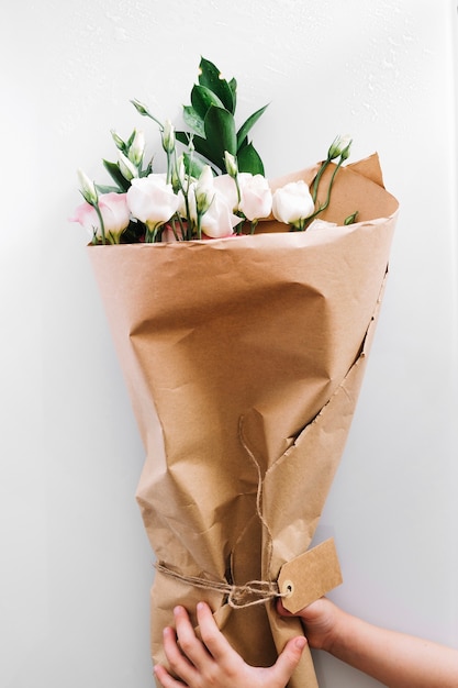 Child holding roses