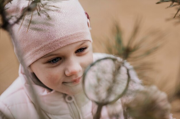 child learning science in the nature