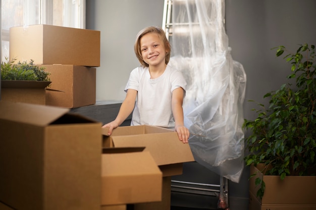 Free photo child moving into a new home