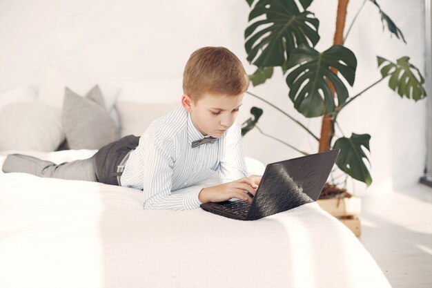 Child at the office with a laptop