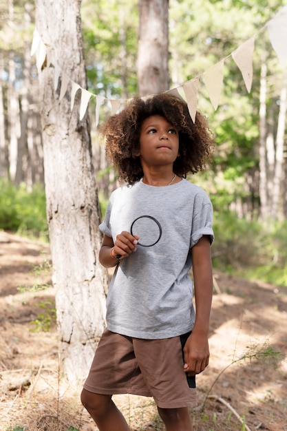 Free photo child participating in a treasure hunt