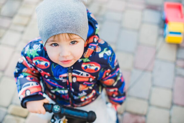 Child playing outside on playground