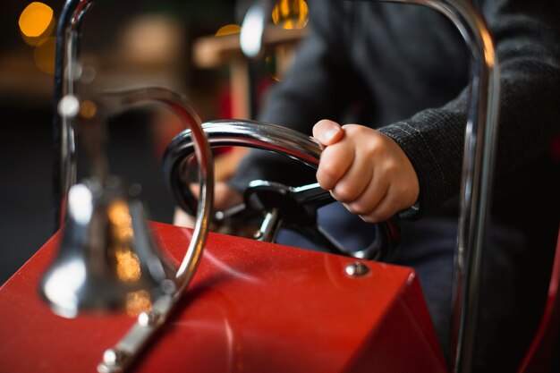 Child playing with toy car