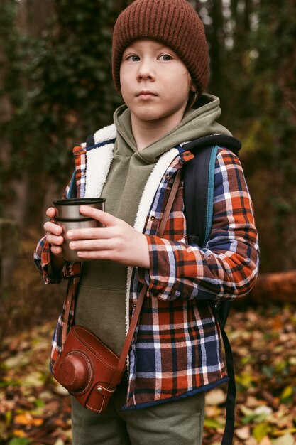 Child posing outdoors while on a road trip