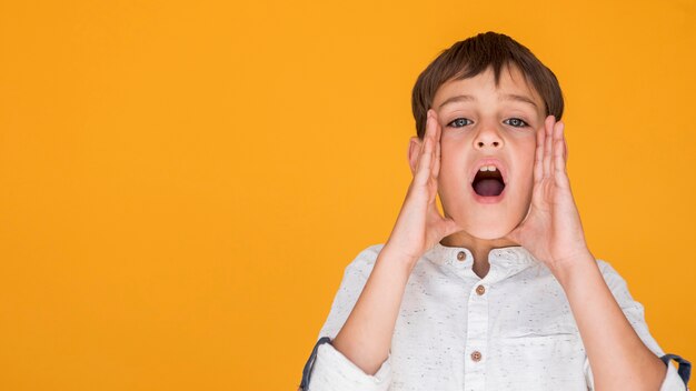 Child shouting with copy space