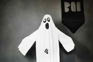 Free photo child wearing ghost costume