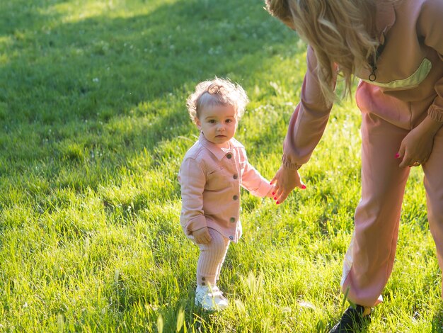 Child wearing pink clothes high view