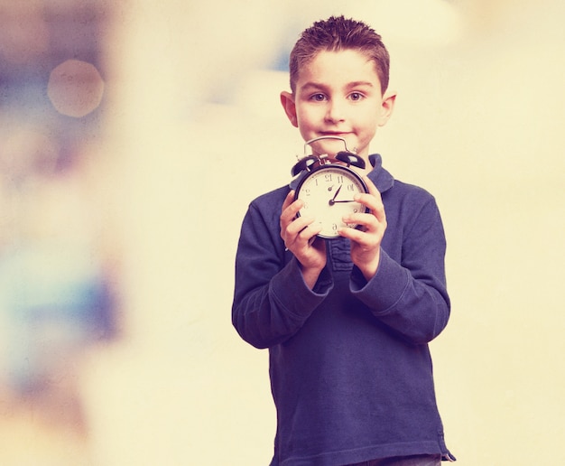 Child with a alarm clock