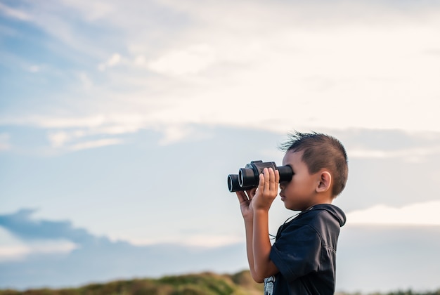 Child with binoculars