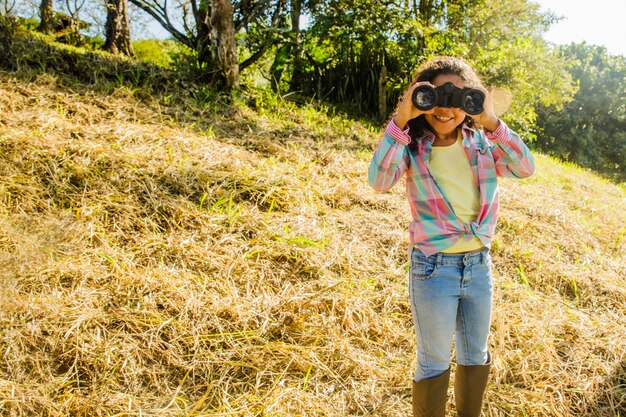 Child with binoculars