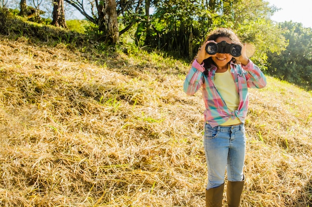 Child with binoculars