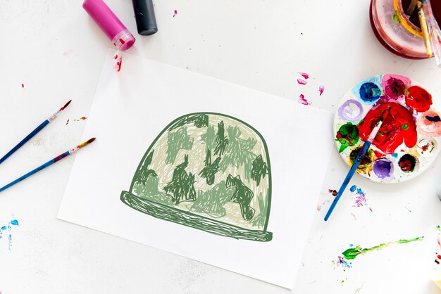 Child with a drawing of soldier helmet