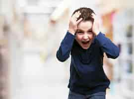 Free photo child with hands on head