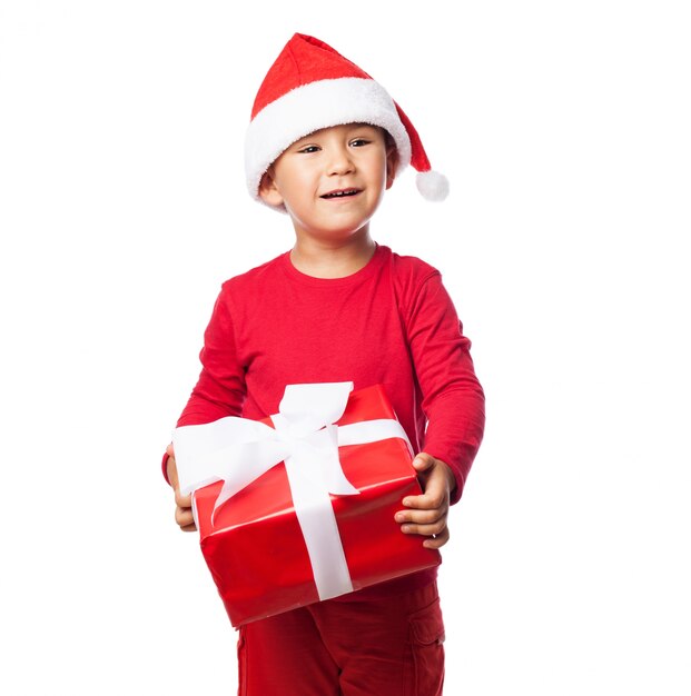 Child with a red gift