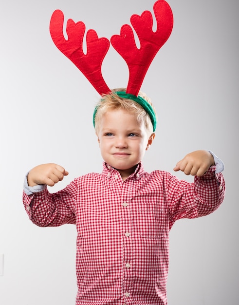 Child with reindeer antlers