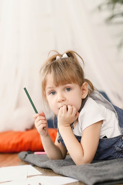 Childhood. Young girl at home